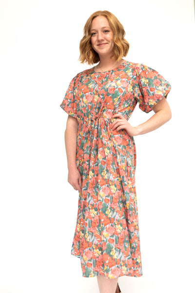 Medium coral floral dress with short sleeves