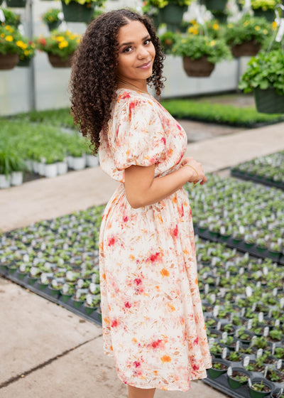 Side view of the multi floral printed dress