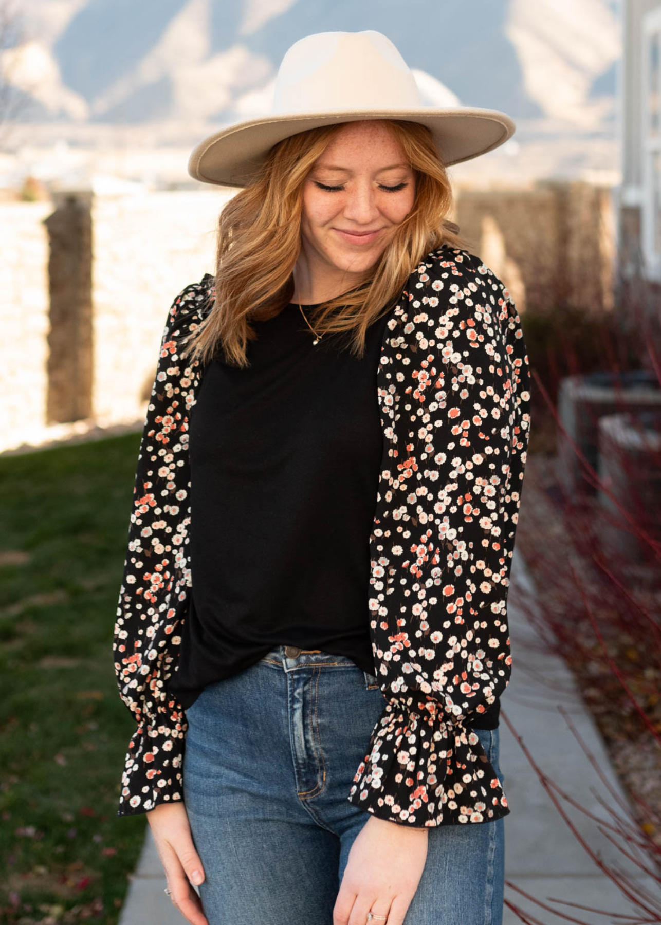 Solid bodice on a black pattern sleeve top