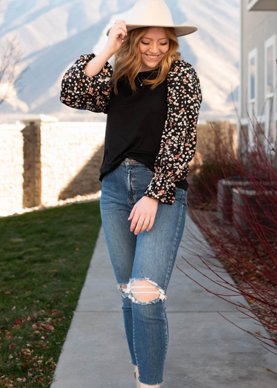 Black pattern sleeve top with floral sleeve