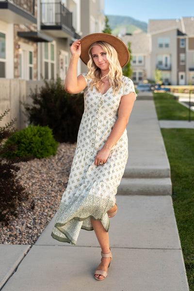 Button up olive dress with cap sleeves and patterned fabric