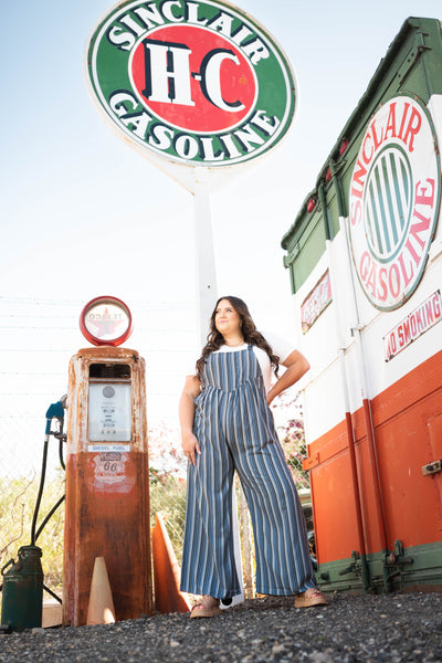 Plus size midnight blue jumpsuit with gathered waist