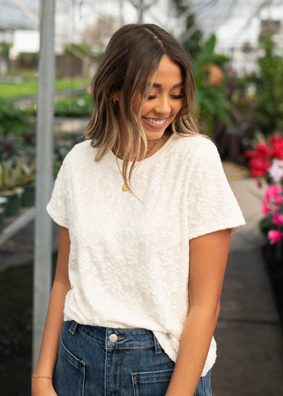 Small ivory floral textured top