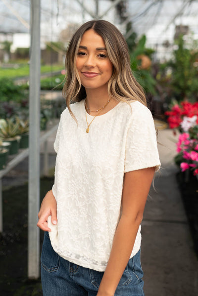 Round neck ivory floral textured top