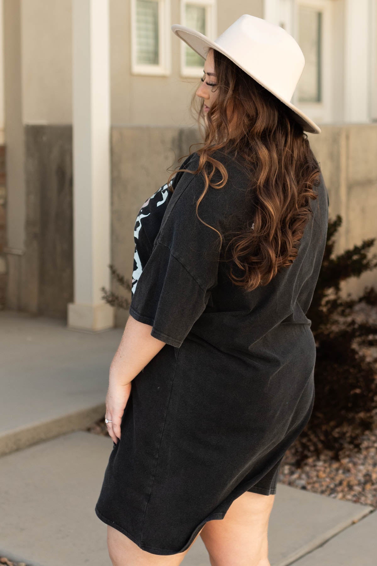 Side view of a plus size howdy yall charcoal t-shirt dress