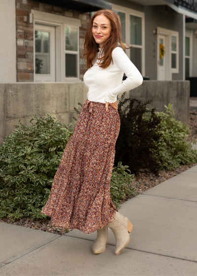 Side view of a burgundy floral skirt