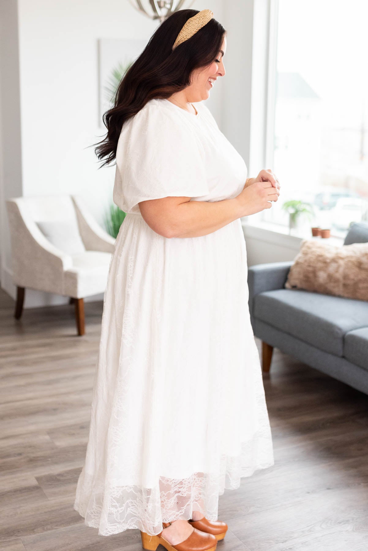 Side view of the plus size white lace dress