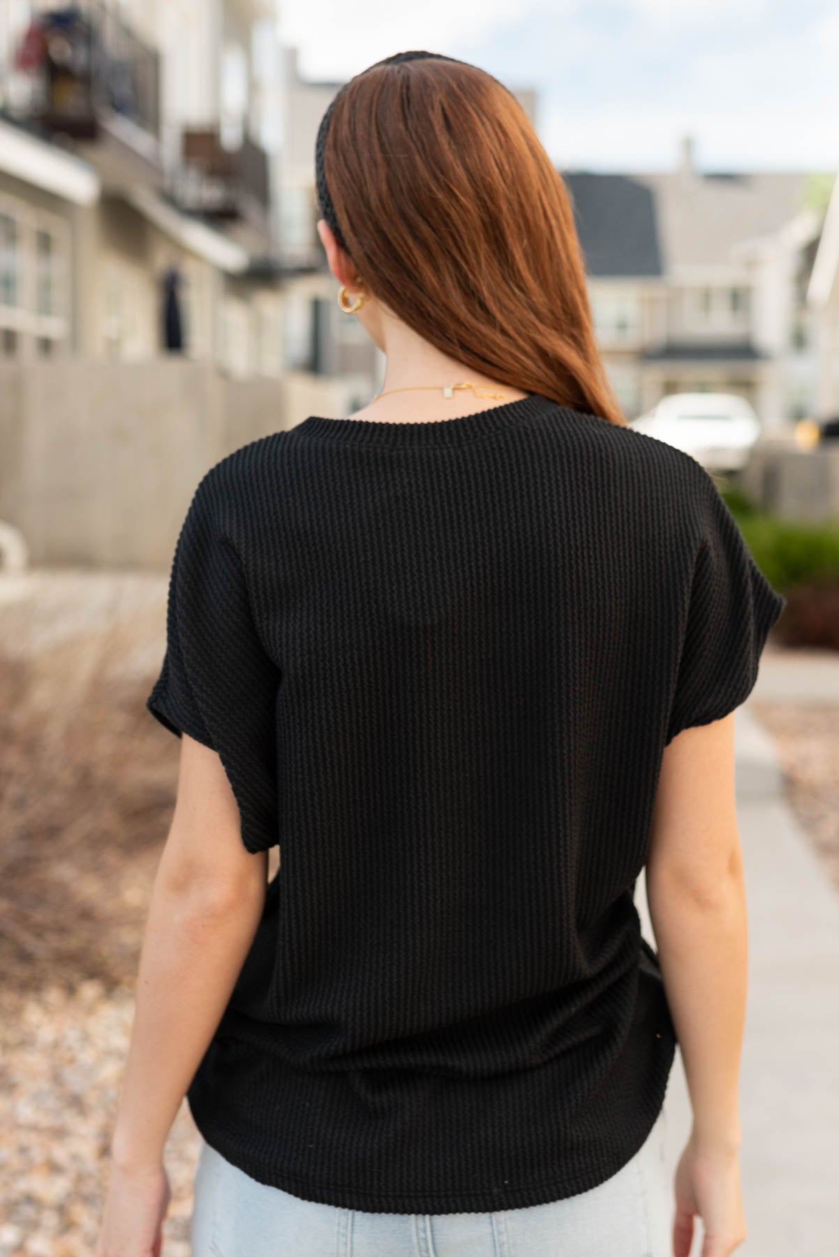 Back view of the the black ribbed top