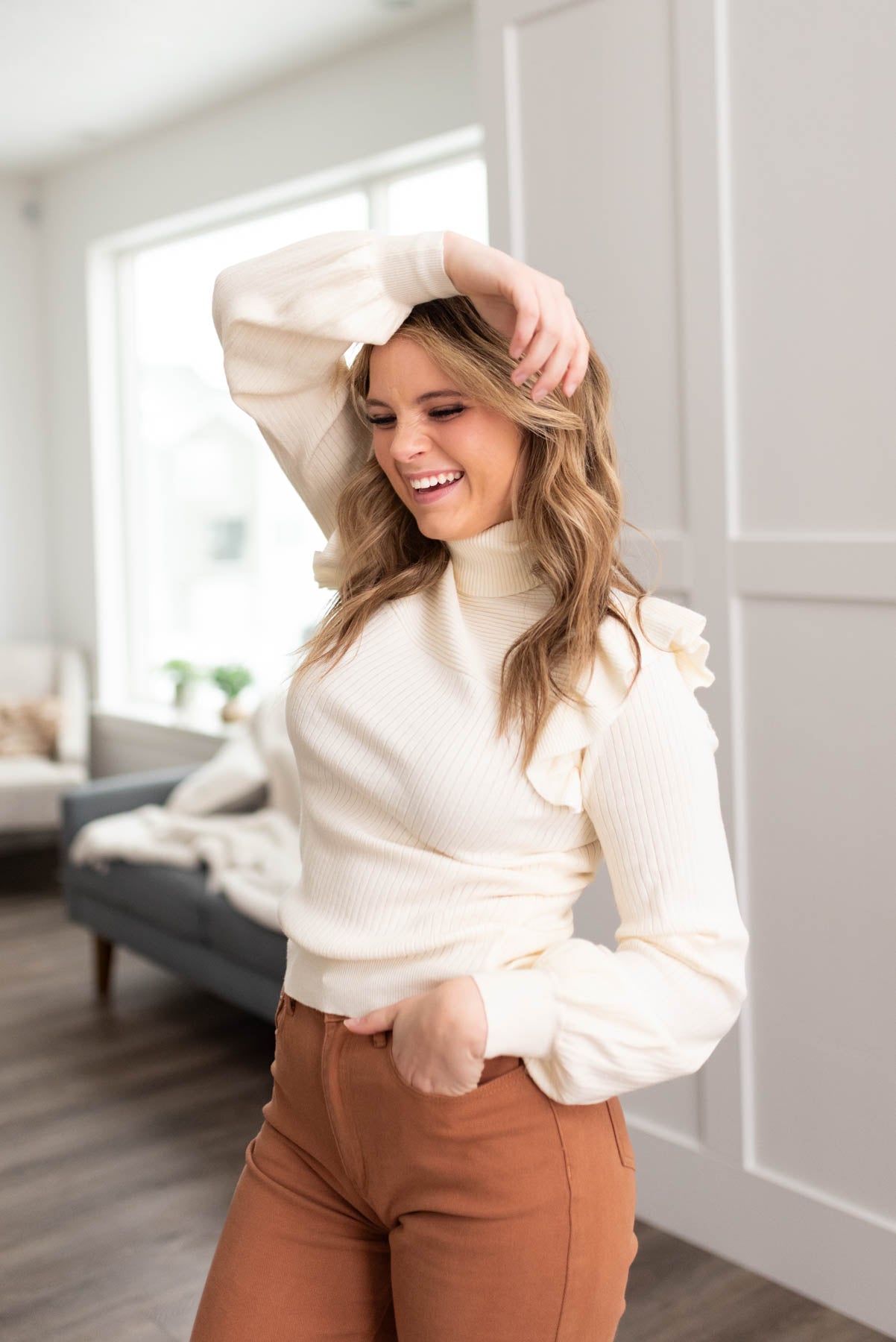 Ivory ruffle turtleneck sweater with long sleeves