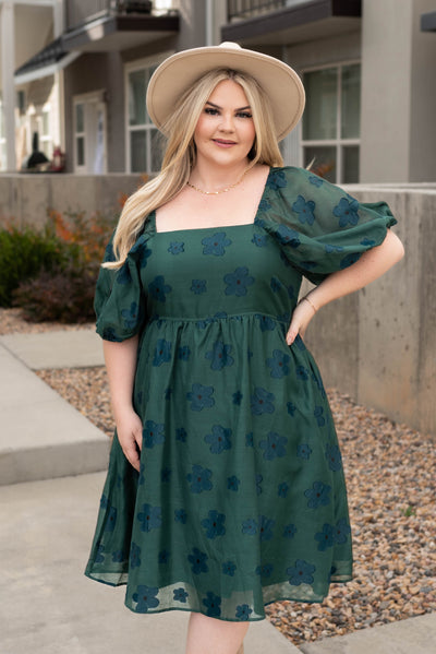 Short sleeve plus size hunter green floral dress with navy flowers and square neck