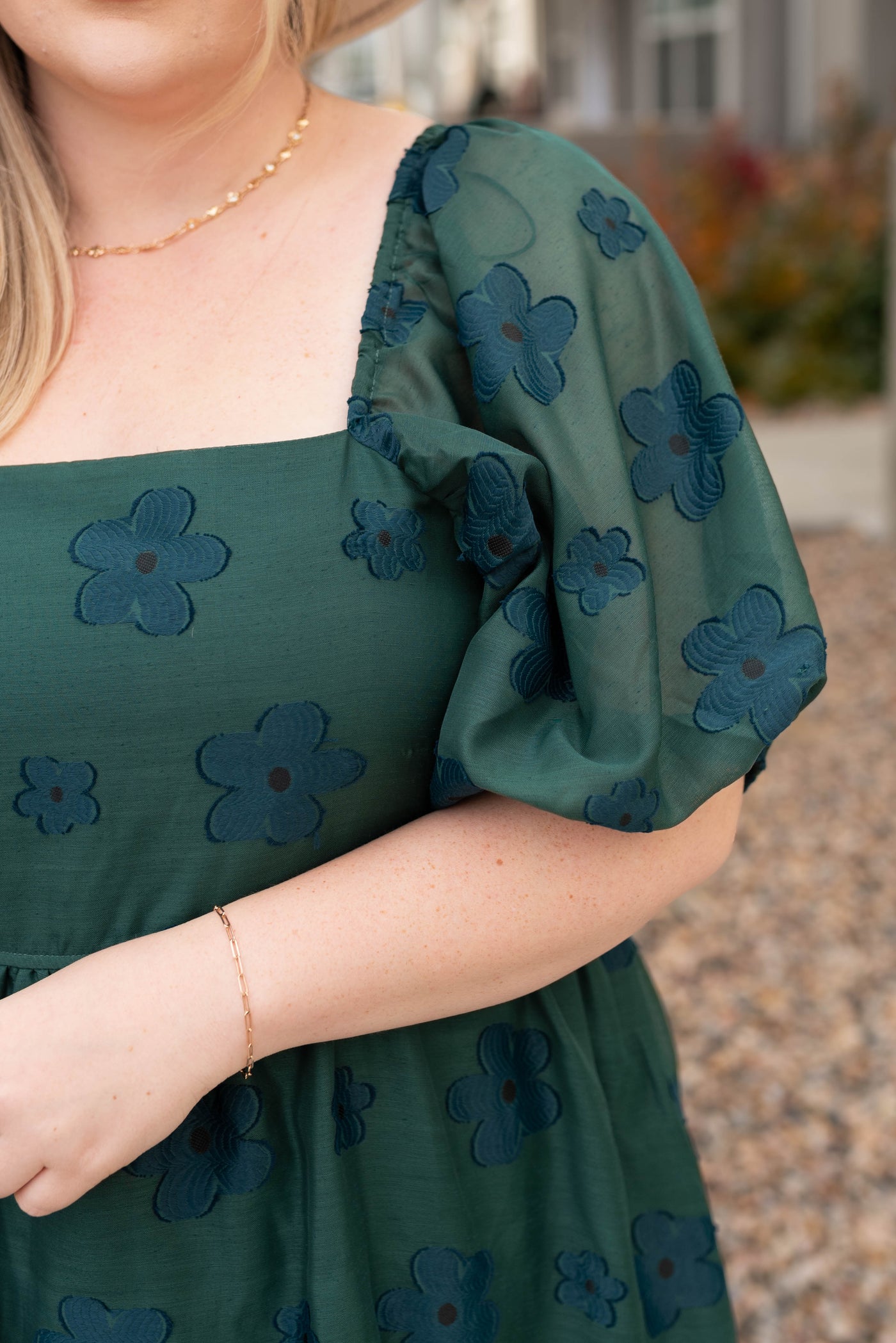 Full sleeve of the plus size hunter green floral dress