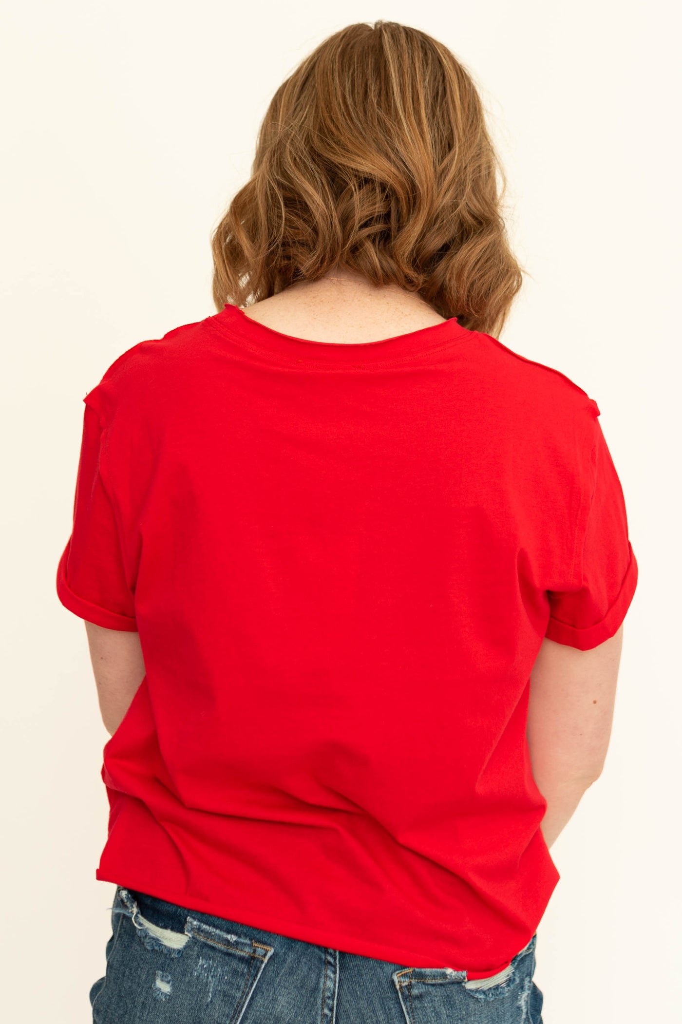 Back view of a red short sleeve top