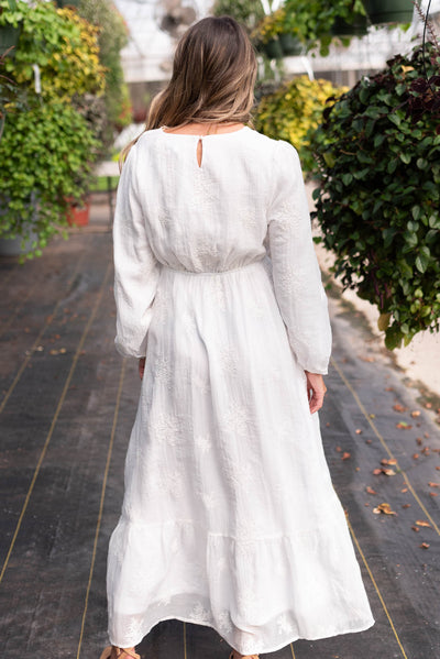 Back view of the embroidered white dress