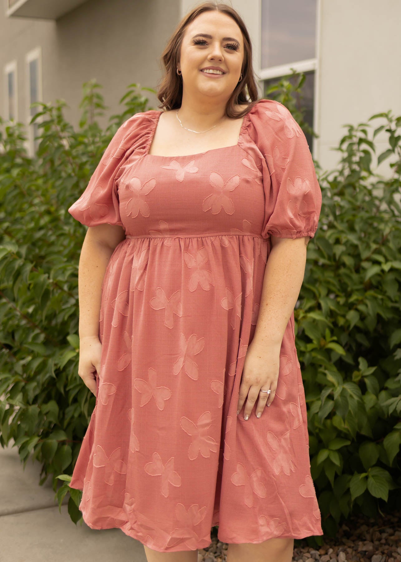 Plus size dusty rose dress with a square neck