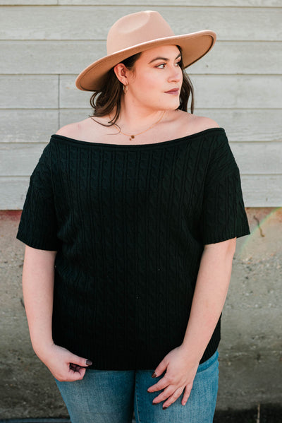 Off the shoulder black knit top