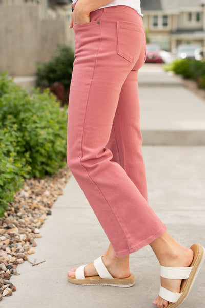 Side view of mauve pants with pockets
