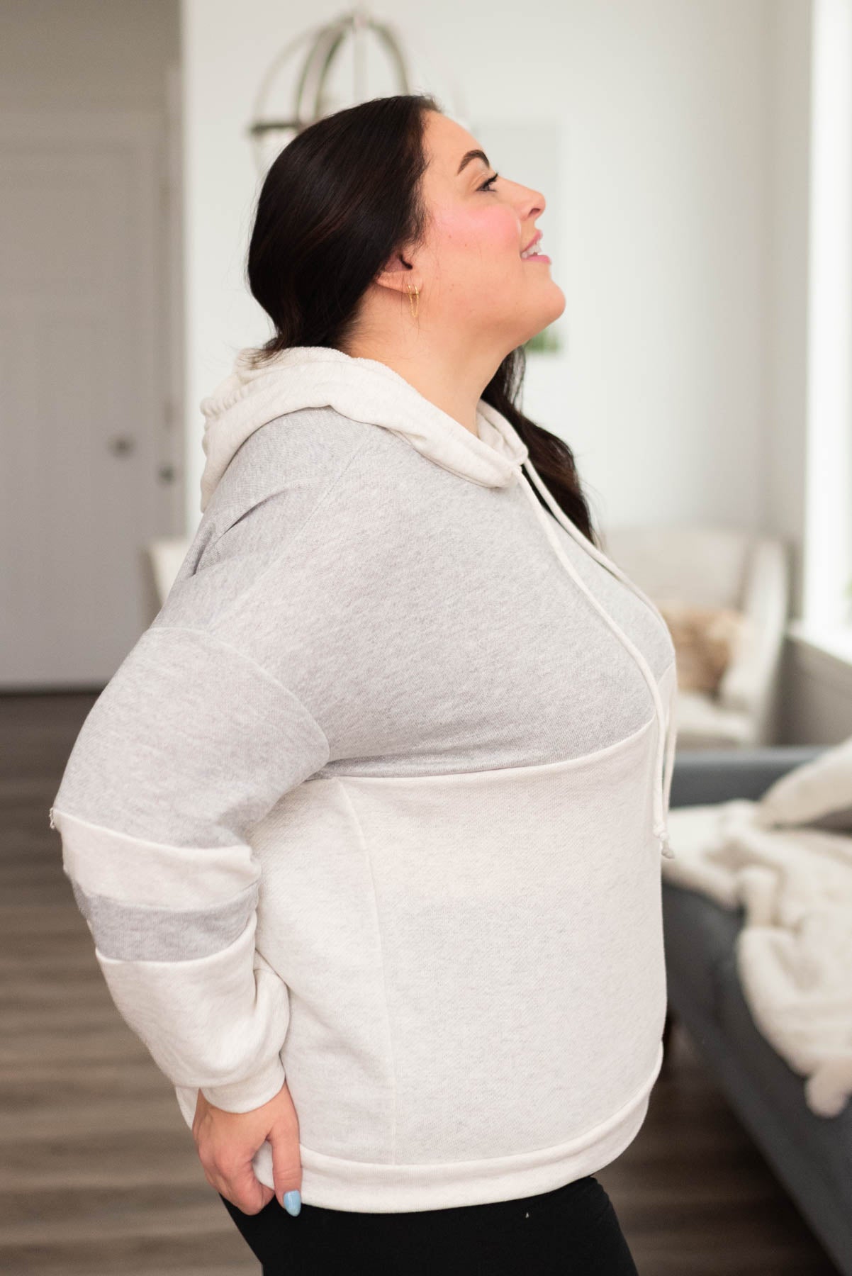 Side view of a plus size grey block hoodie