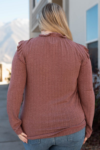 Back view of a plus size burgundy ruffle long sleeve dress