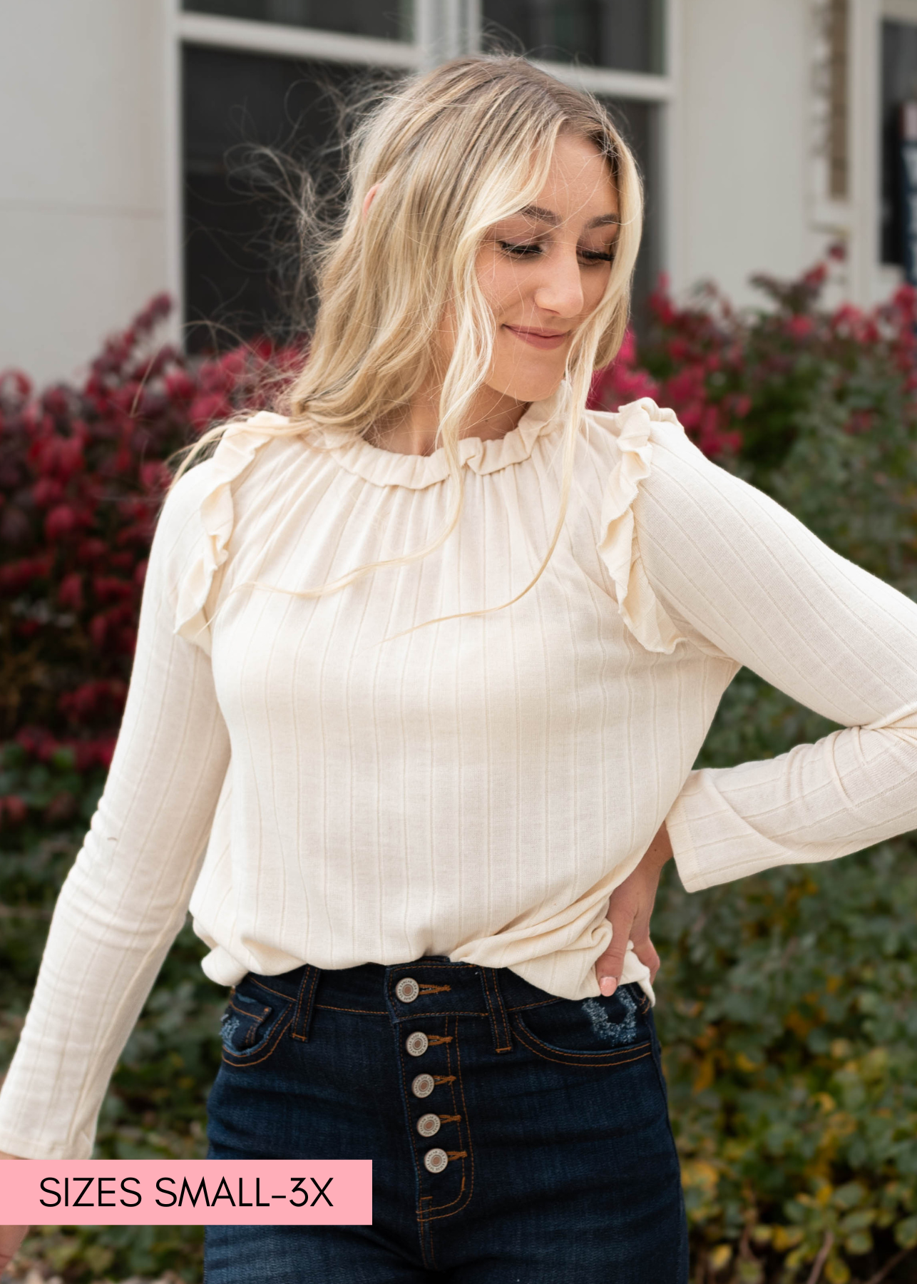 Cream ruffle long sleeve top with ruffle around the neck