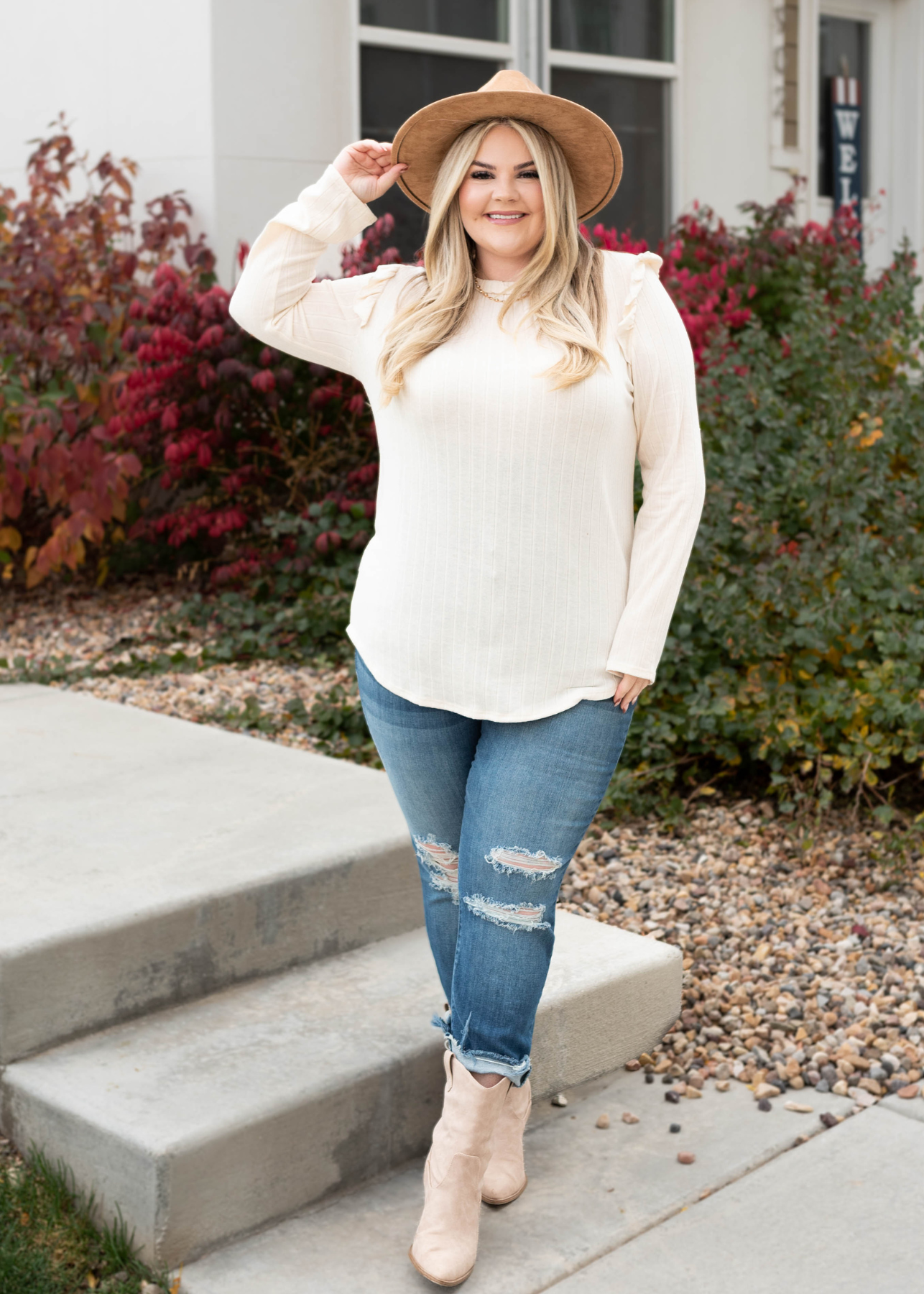 Plus size cream ruffle long sleeve top