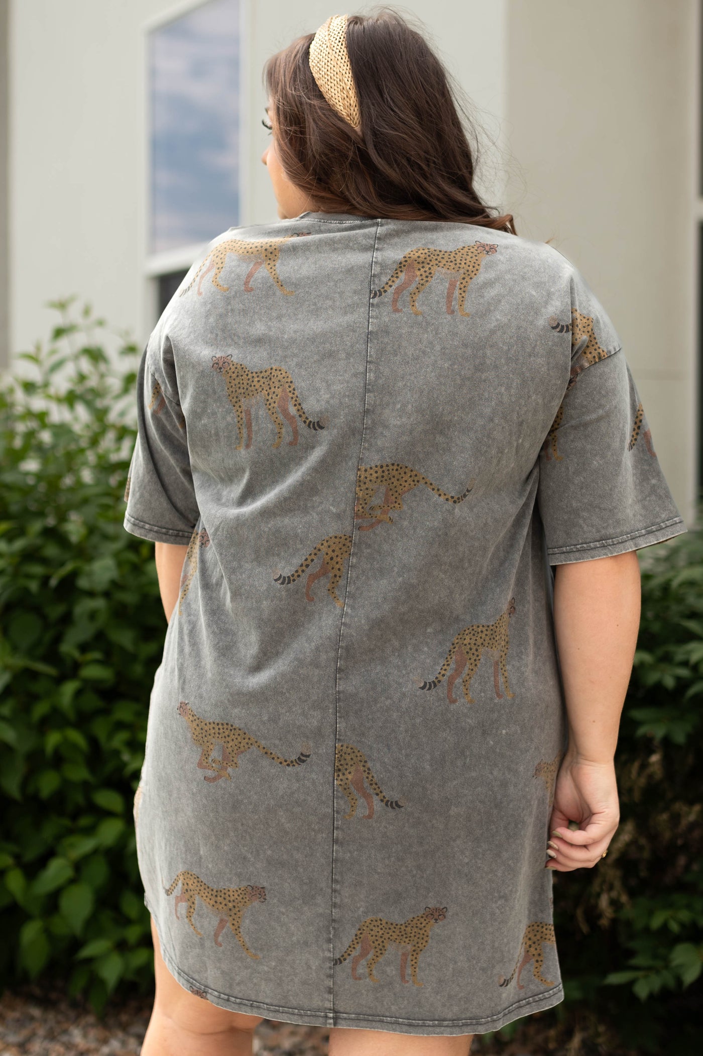 Back view of a short sleeve plus size tiger print dress