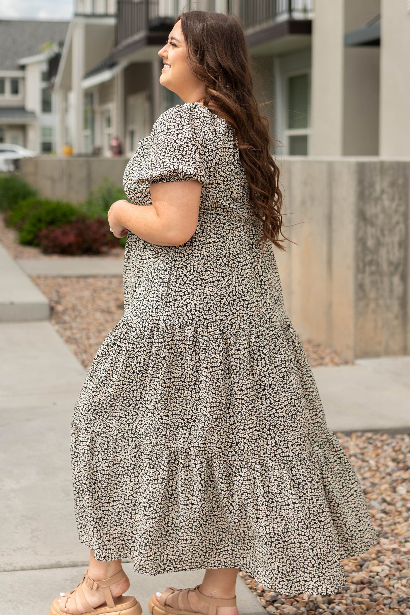 Side view of a black floral dress