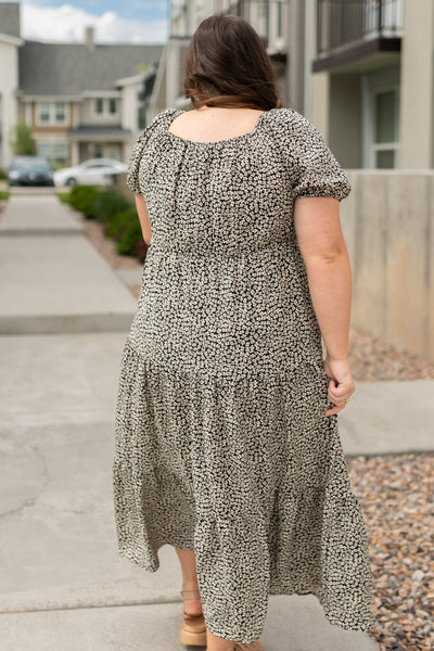 Back view of a plus size black dress