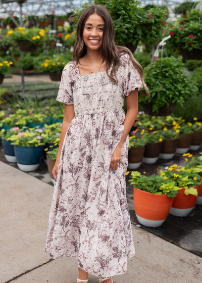 Short sleeve cream floral smocked dress