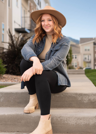 Long sleeve button up blue top with a collar