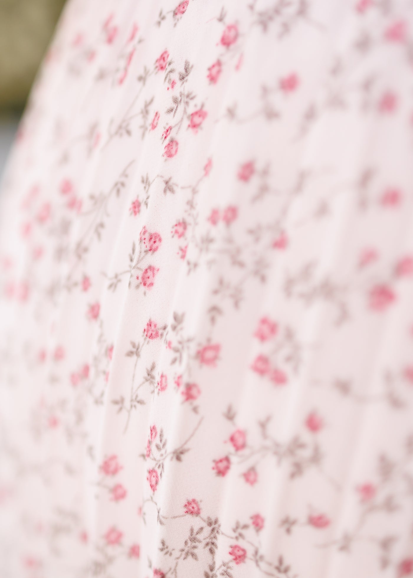 Close up of the fabric on the white floral skirt