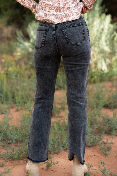 Back view of black pants with pockets