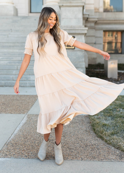 Short sleeve tiered cream dress