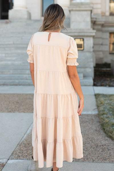 Back view of the tiered cream dress