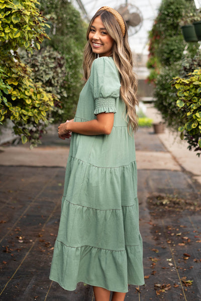 Side view of the tiered green dress