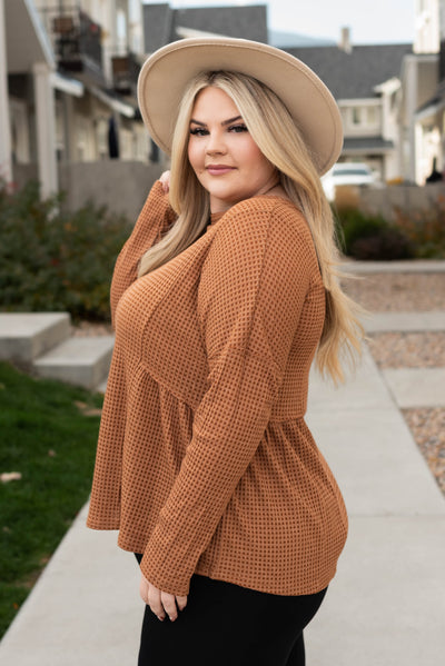 Side view of the plus size brown top