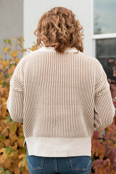 Back view of the cream knit sweater