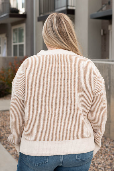 Back view of the plus size cream knit sweater