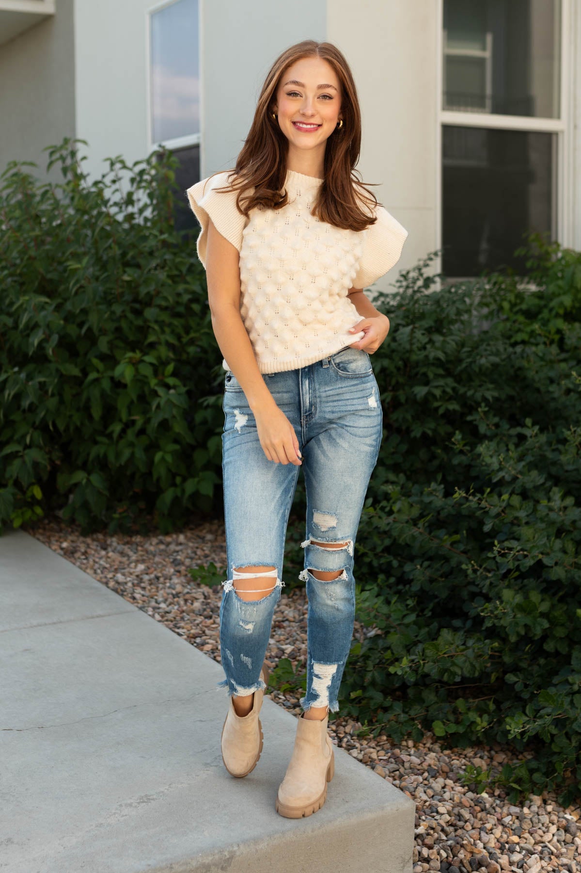 Cream top sweater with short cap sleeves