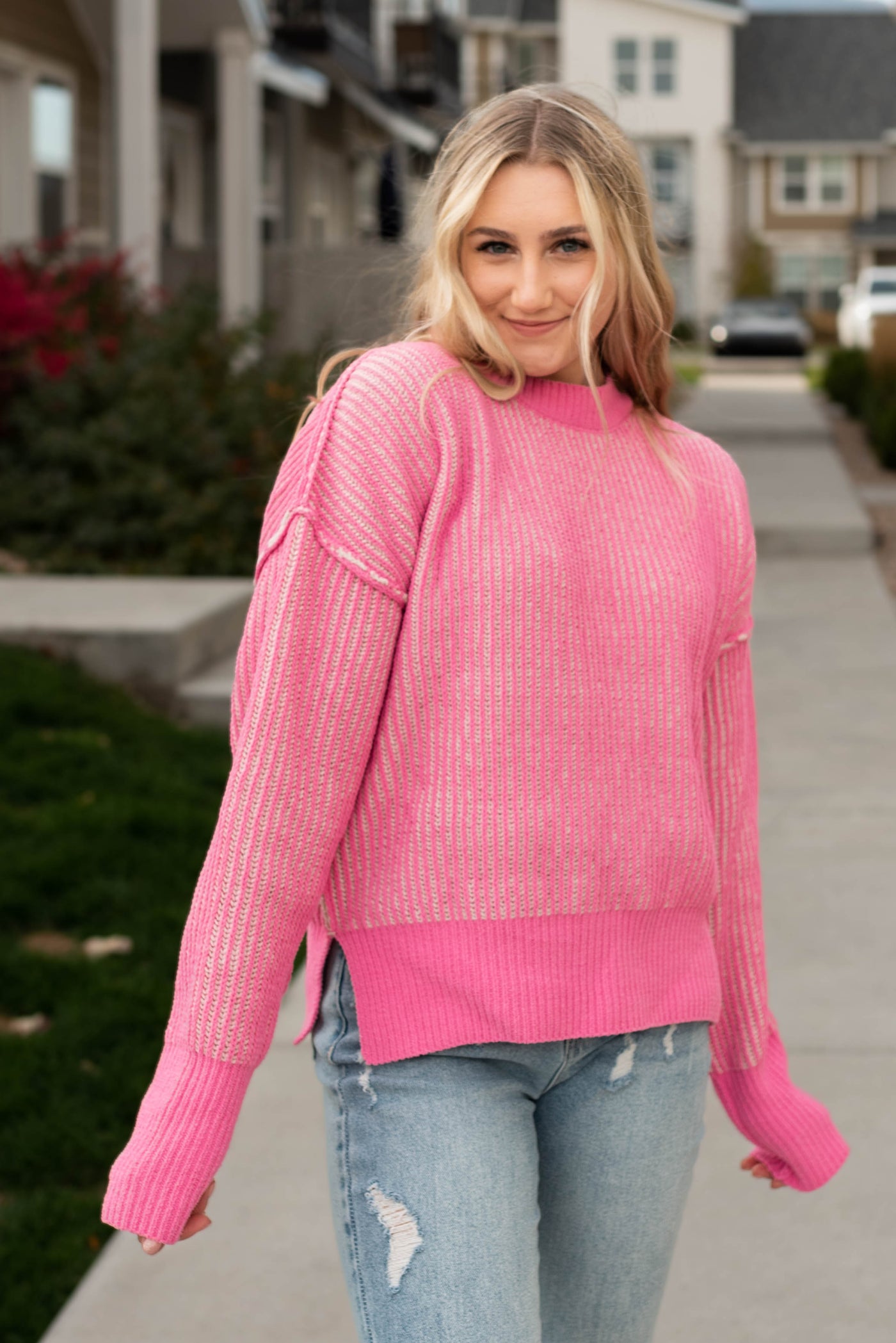 Front view of the pink knit sweater