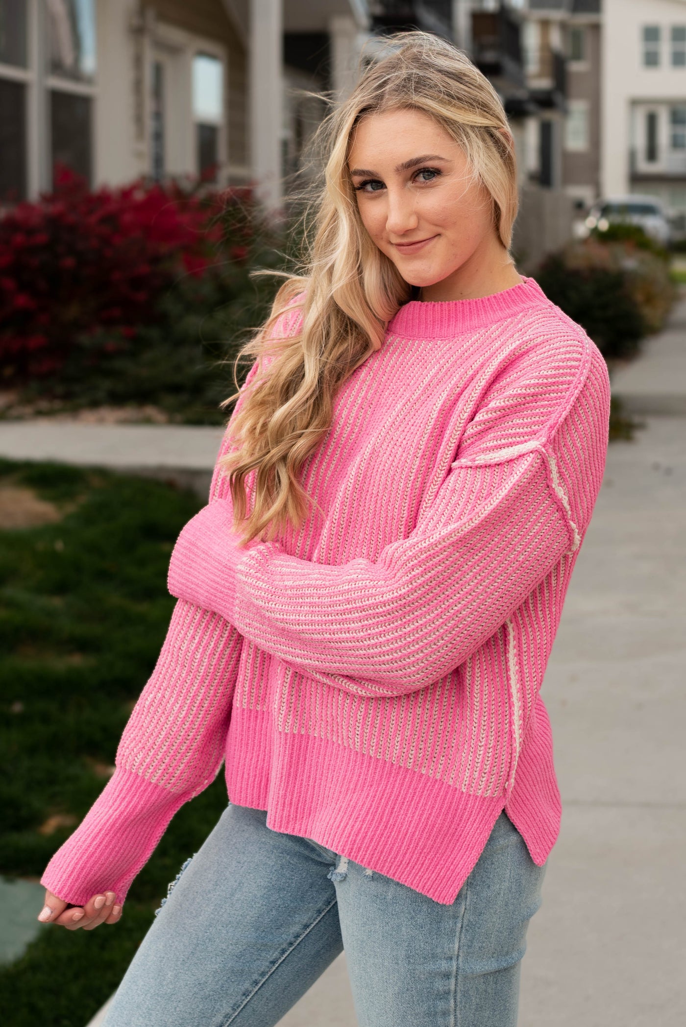 Side view of the pink knit sweater