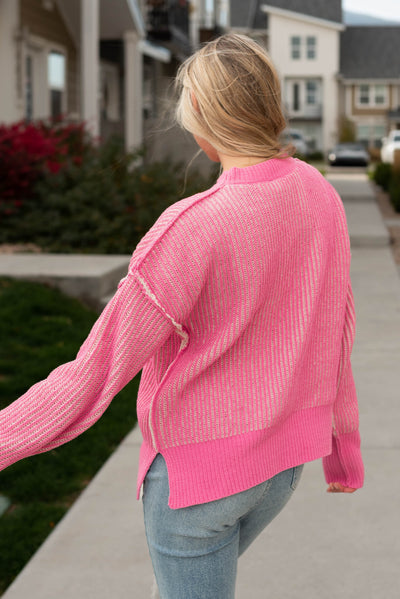 Back view of the pink knit sweater