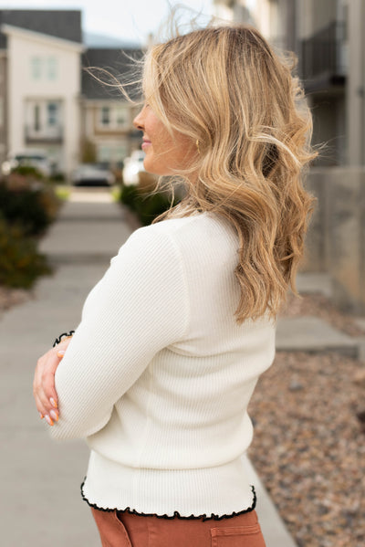 Side view of the high neck rib top