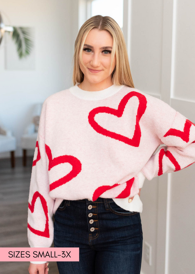 Front view of the red heart sweater