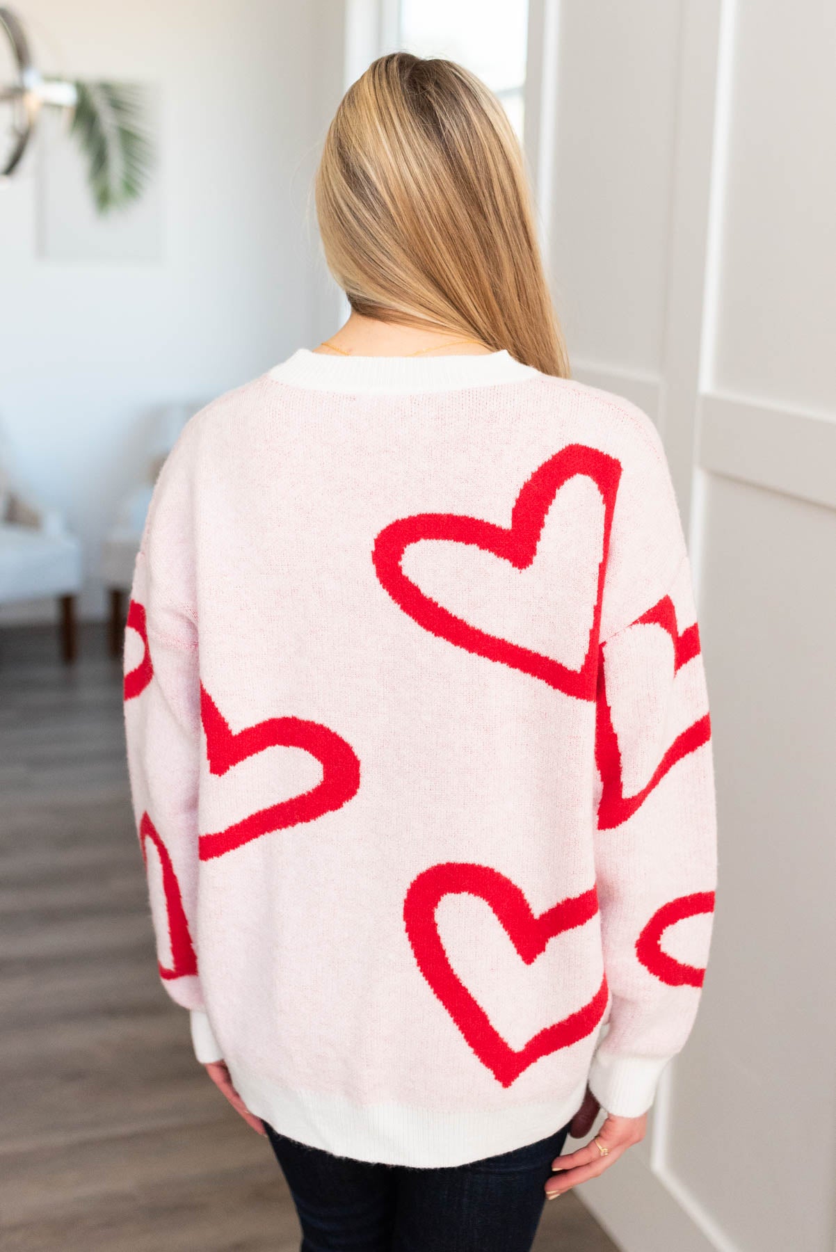 Back view of the red heart sweater