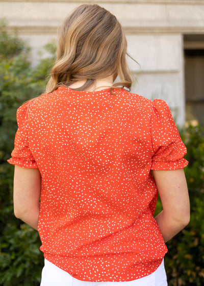 Back view of a red top