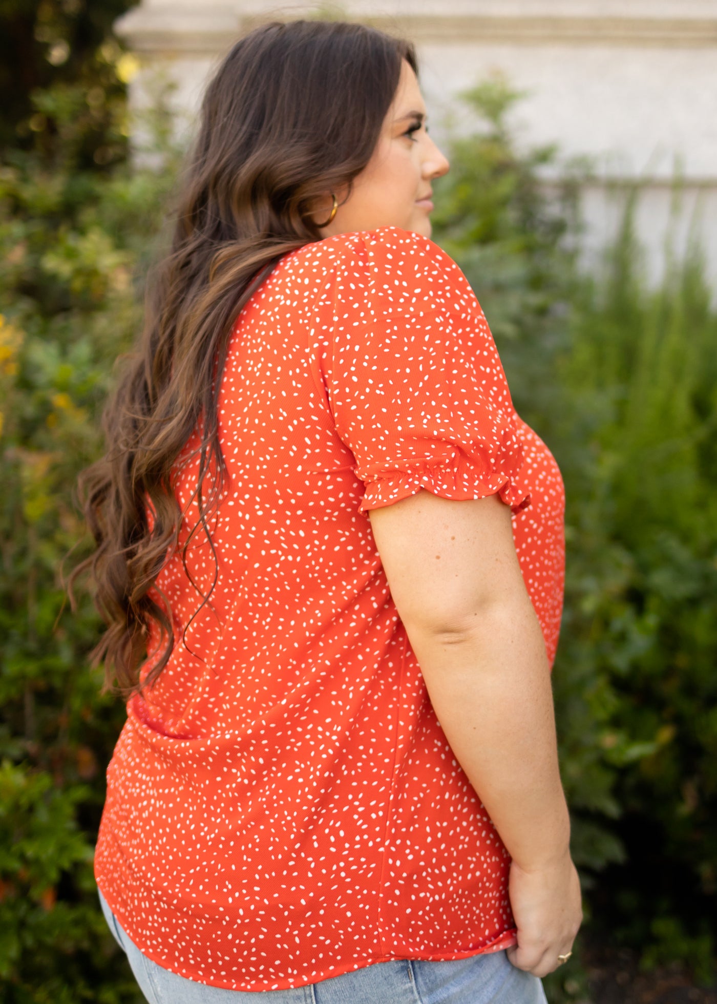 Side view of a red top