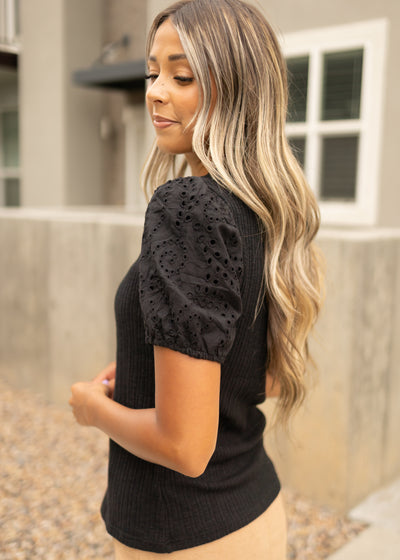 Side view of a black top