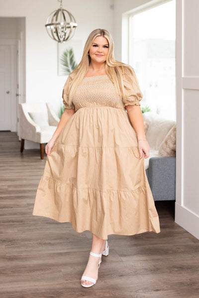 Short sleeve plus size taupe dress with tiered skirt and smocked bodice