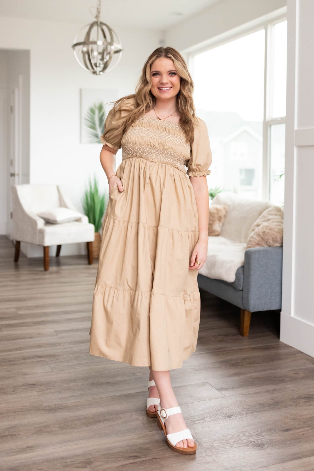 Short sleeve taupe dress with a tiered skirt
