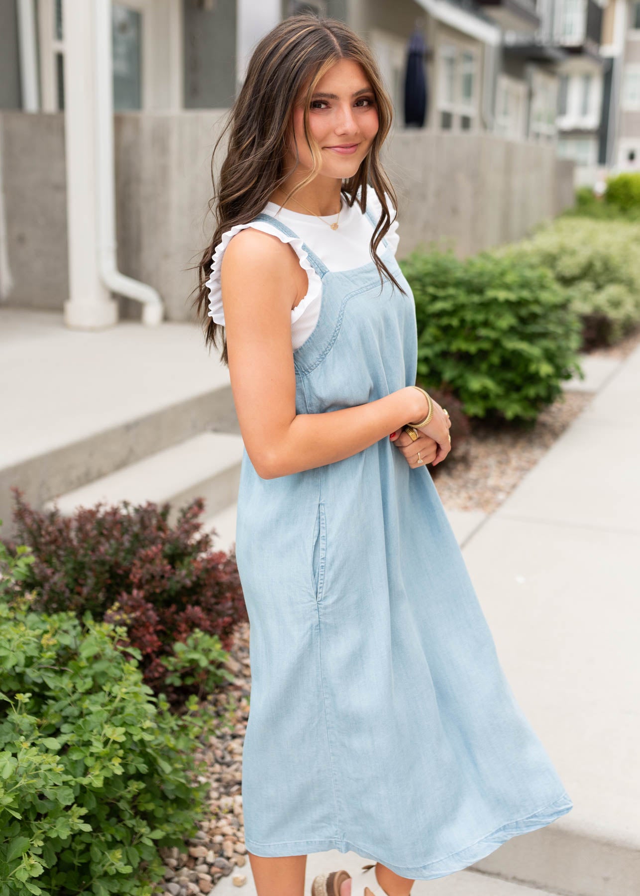 Side view of the denim-like strap dress